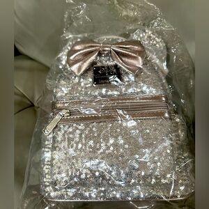 Disney Loungefly silver sequin backpack, NWT, still in packaging.
